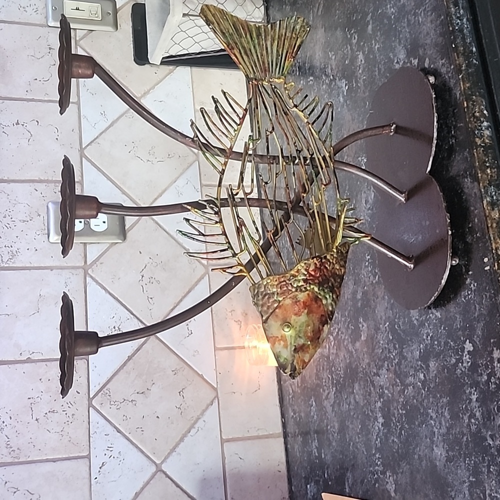 Solid metal fish 3 pillar candle holder some scratches around bottom edge